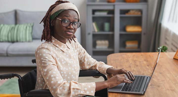 YOung professional woman working at her laptop